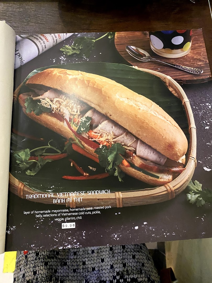 A close-up of a traditional Vietnamese Banh Mi sandwich from the restaurant's menu.