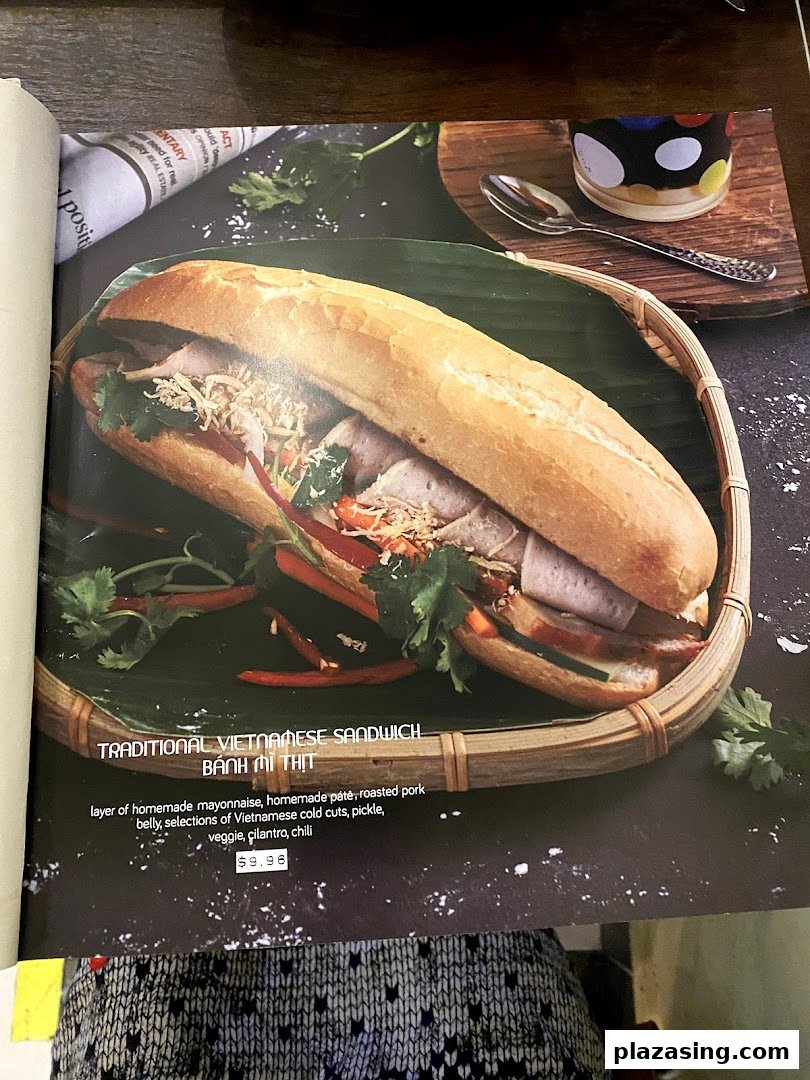 A close-up of a traditional Vietnamese Banh Mi sandwich from the restaurant's menu.