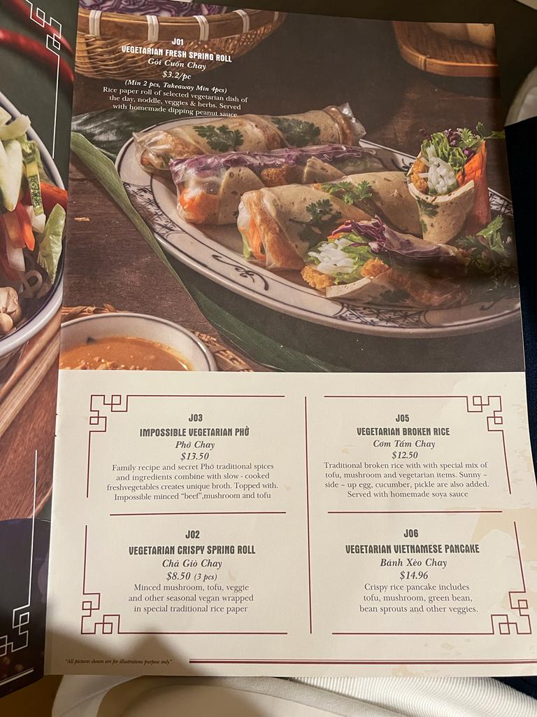 A menu page showcasing various vegetarian Vietnamese dishes with descriptions and prices.