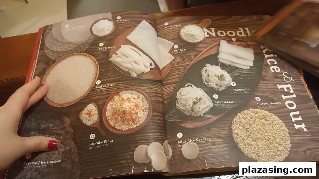 An open menu page from Co Chung Vietnamese Restaurant, showcasing various rice, flour, and noodle ingredients.