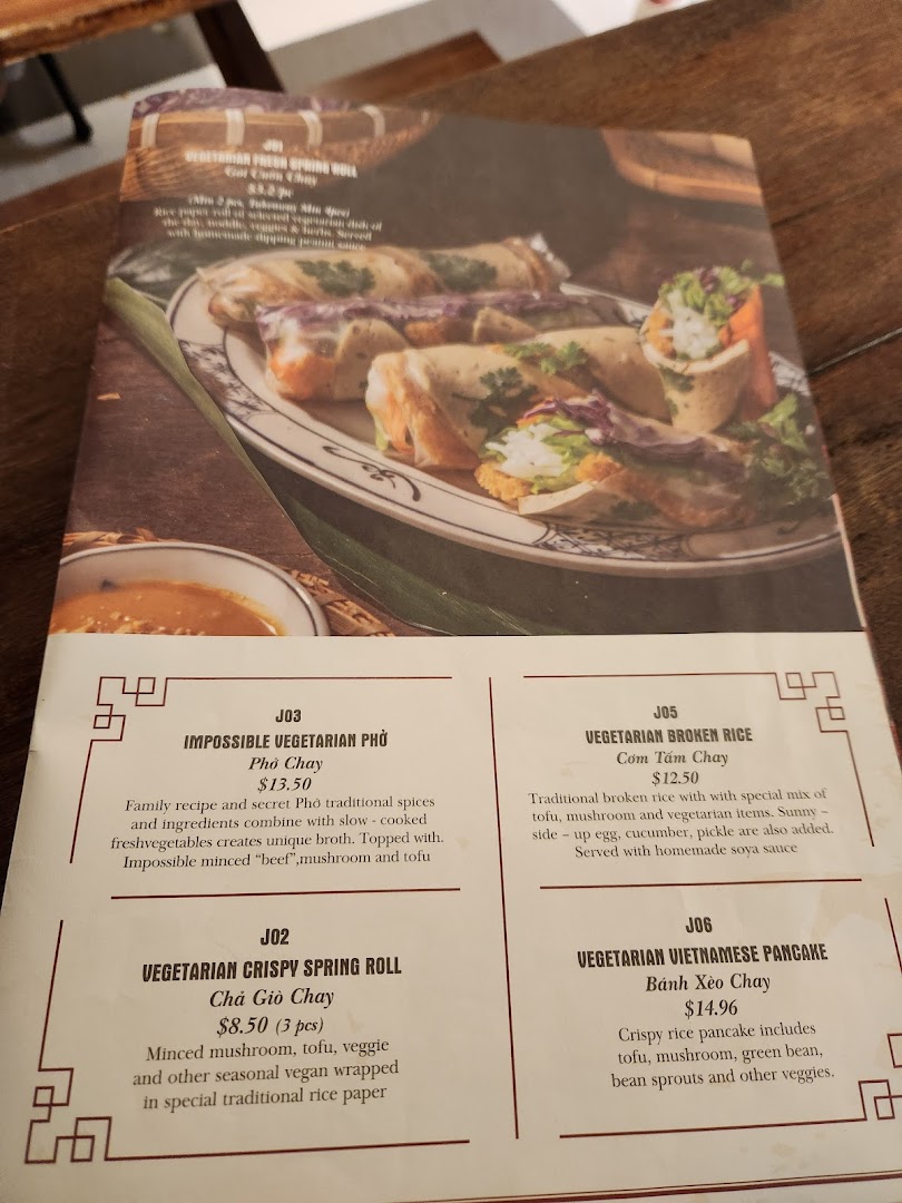 A menu page from Co Chung Vietnamese Restaurant, showcasing vegetarian dishes with descriptions and prices.