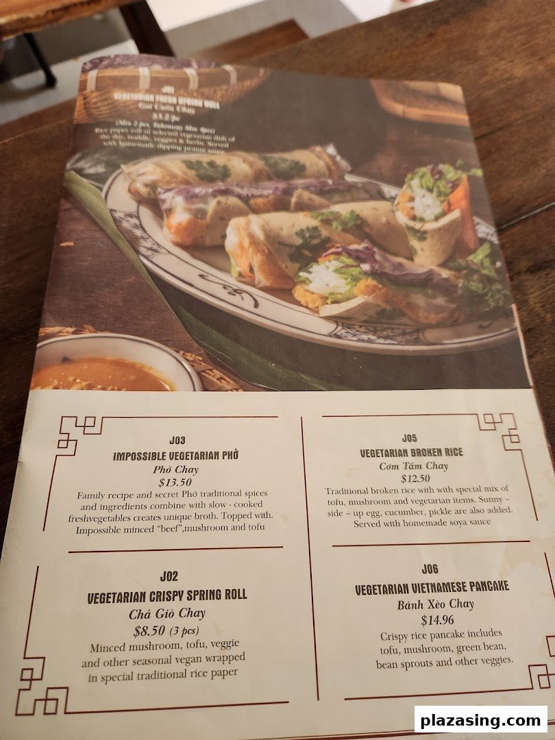 A menu page from Co Chung Vietnamese Restaurant, showcasing vegetarian dishes with descriptions and prices.