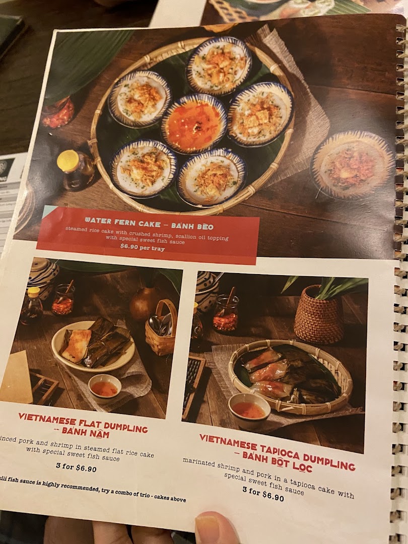A menu page displaying traditional Vietnamese cakes and dumplings with descriptions and prices.