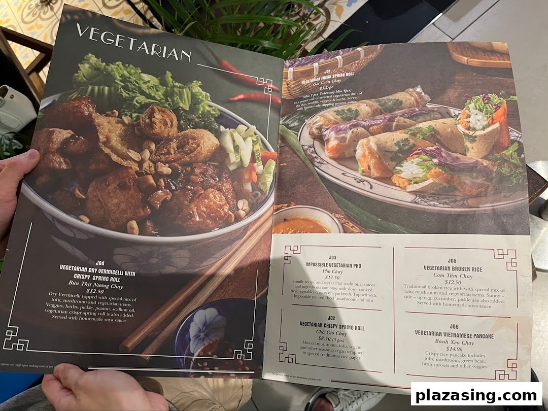 A close-up view of Co Chung Vietnamese Restaurant's vegetarian menu, showcasing various dishes.