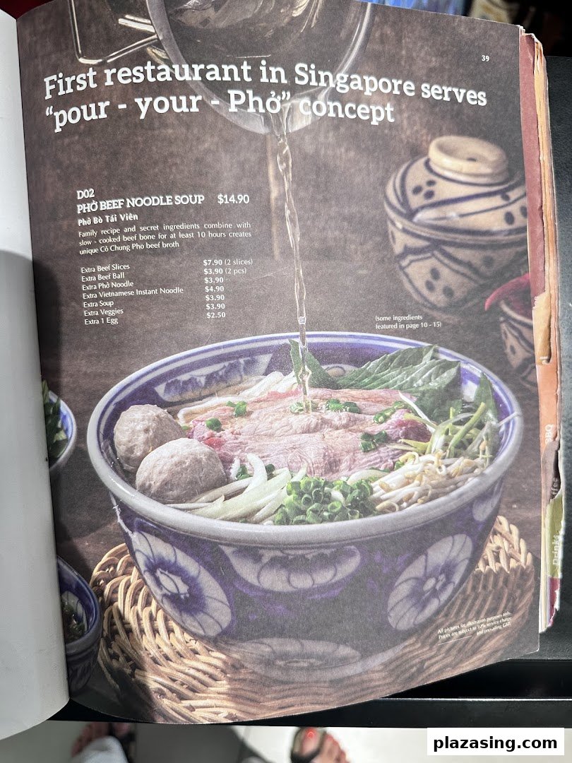 A menu page featuring a 'pour-your-pho' concept with a bowl of beef noodle soup and add-on options.