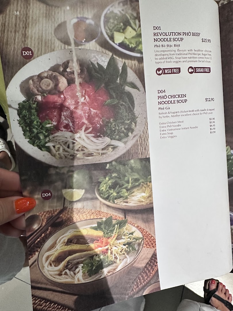 A menu page from Co Chung Vietnamese Restaurant featuring Revolution Pho Beef and Pho Chicken Noodle Soup.