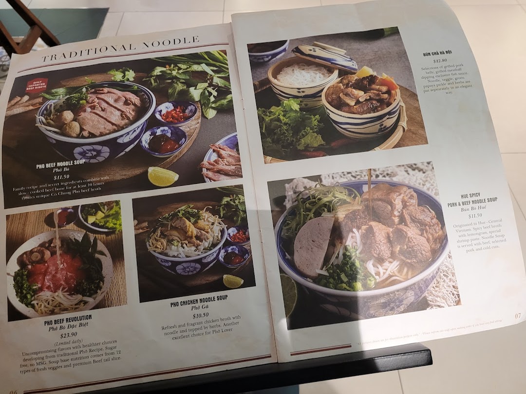 A detailed menu page showcasing various traditional Vietnamese noodle dishes with descriptions and prices.
