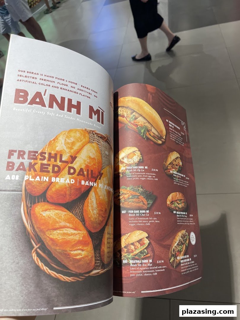 An open menu displaying various authentic Vietnamese Bánh Mì options with descriptions and prices.