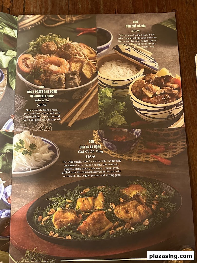 A vibrant menu page showcasing three authentic Vietnamese dishes with descriptions and prices.