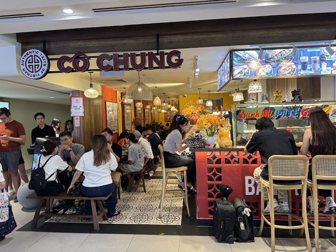 Interior view of Co Chung Vietnamese Restaurant, showing customers dining and the vibrant ambiance.