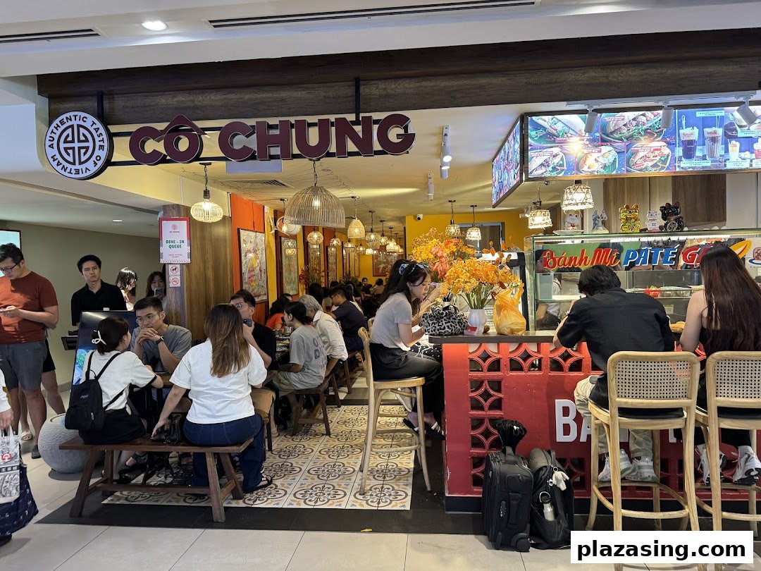 Interior view of Co Chung Vietnamese Restaurant, showing customers dining and the vibrant ambiance.
