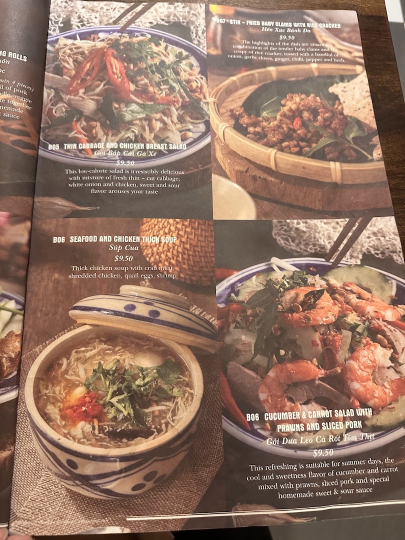 A vibrant menu showcasing authentic Vietnamese salads, soups, and stir-fried dishes with descriptions and prices.