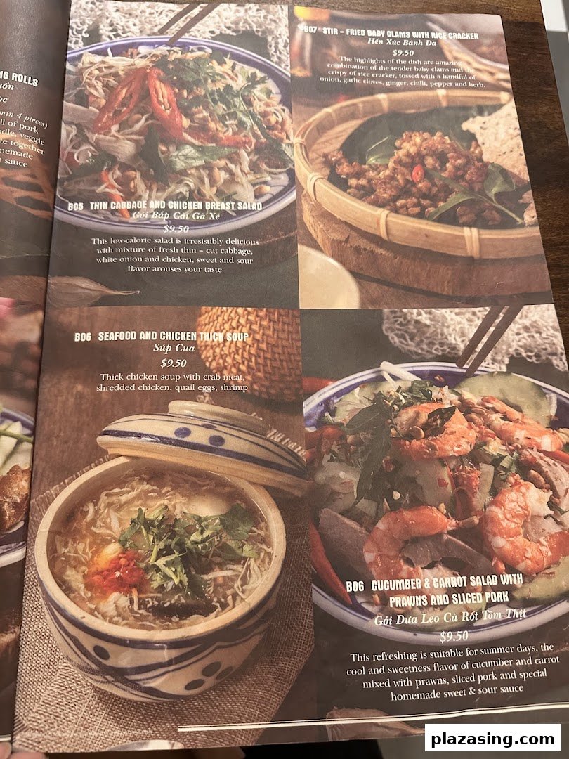 A vibrant menu showcasing authentic Vietnamese salads, soups, and stir-fried dishes with descriptions and prices.