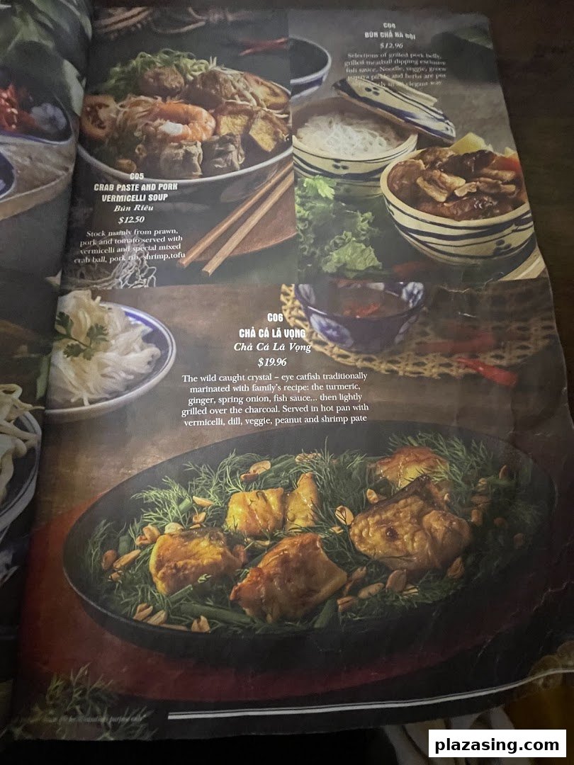 A menu page displaying authentic Vietnamese dishes with their descriptions and prices.