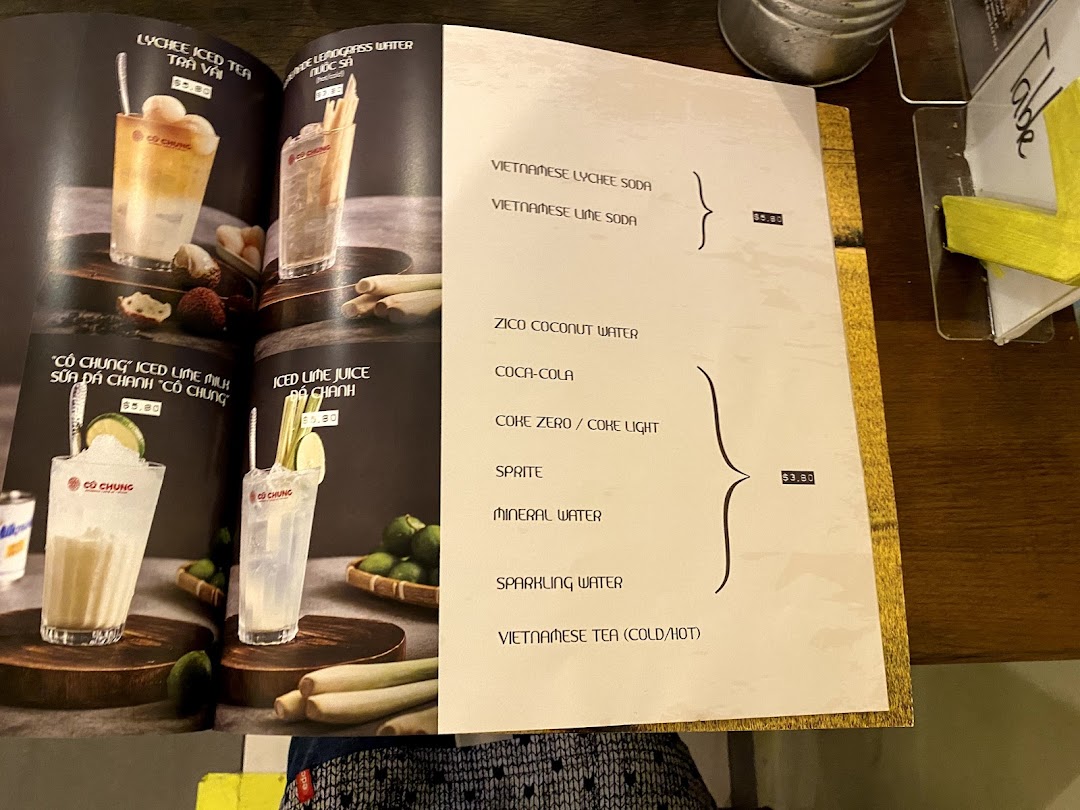 An open menu displaying various refreshing Vietnamese beverages with their prices.