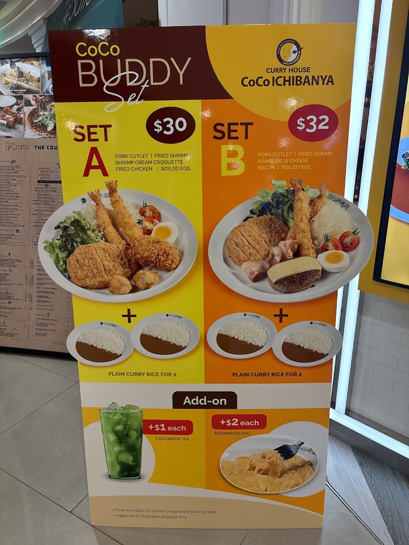 A promotional standee for CoCo ICHIBANYA featuring two 'Buddy Set' meal options with prices and add-ons.