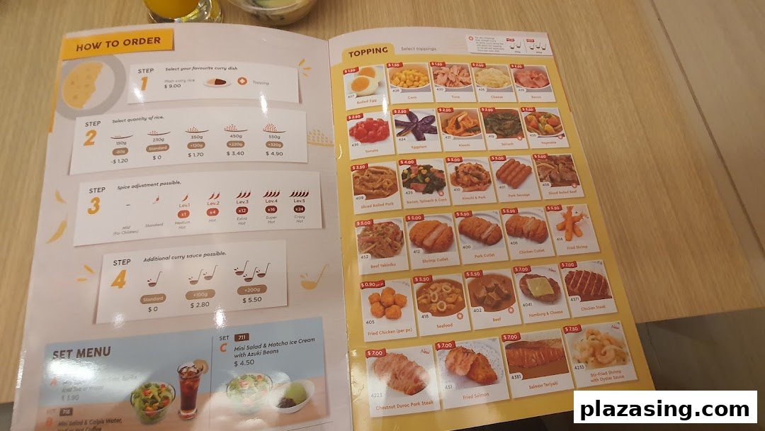 A detailed menu from CoCo ICHIBANYA showing curry customization options and a wide range of toppings.