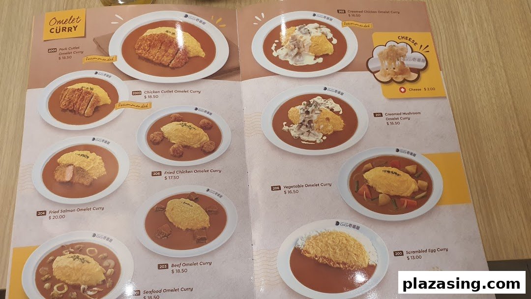 A detailed menu page from CoCo ICHIBANYA featuring various omelet curry dishes and prices.