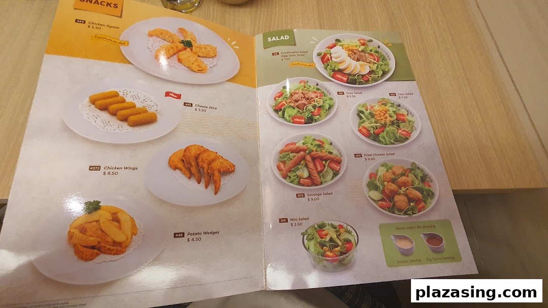A detailed menu page displaying various snacks and salads with prices and images.