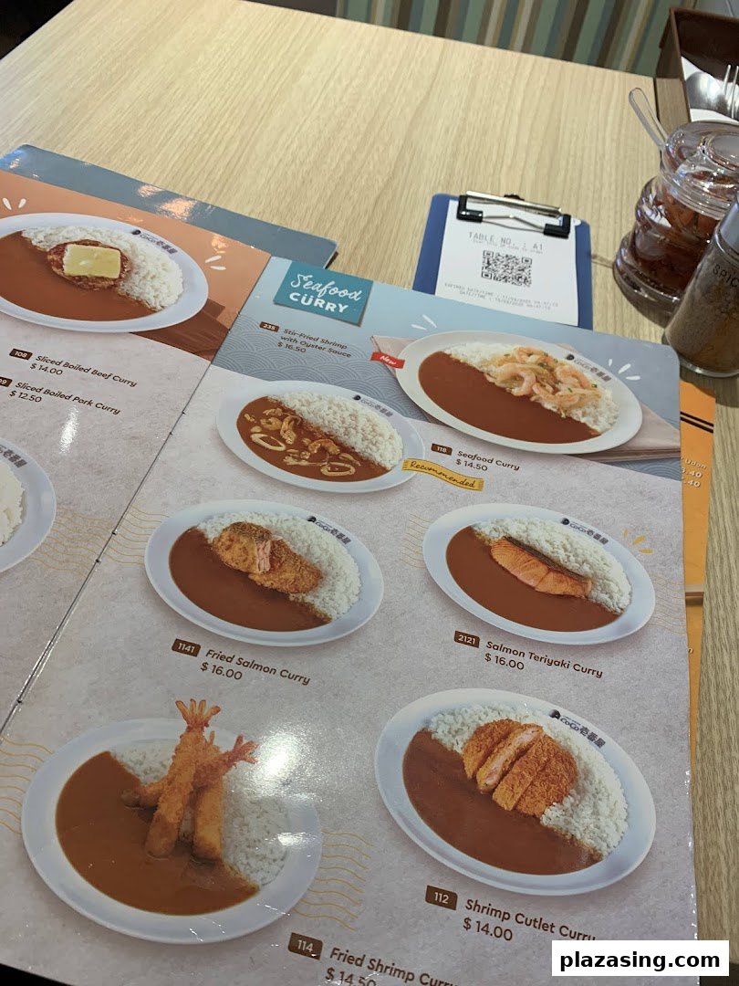 A CoCo ICHIBANYA menu displaying various delicious curry dishes with rice and prices.