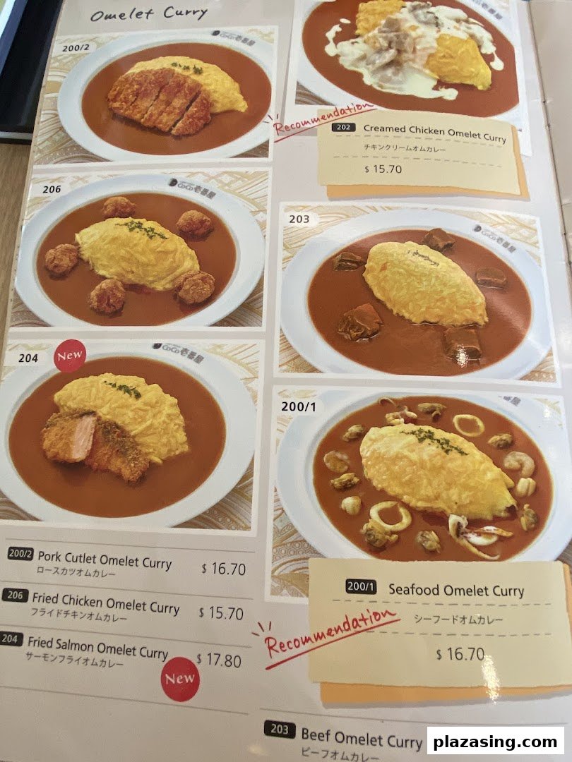 A page from CoCo ICHIBANYA's menu featuring various omelet curry dishes with prices.