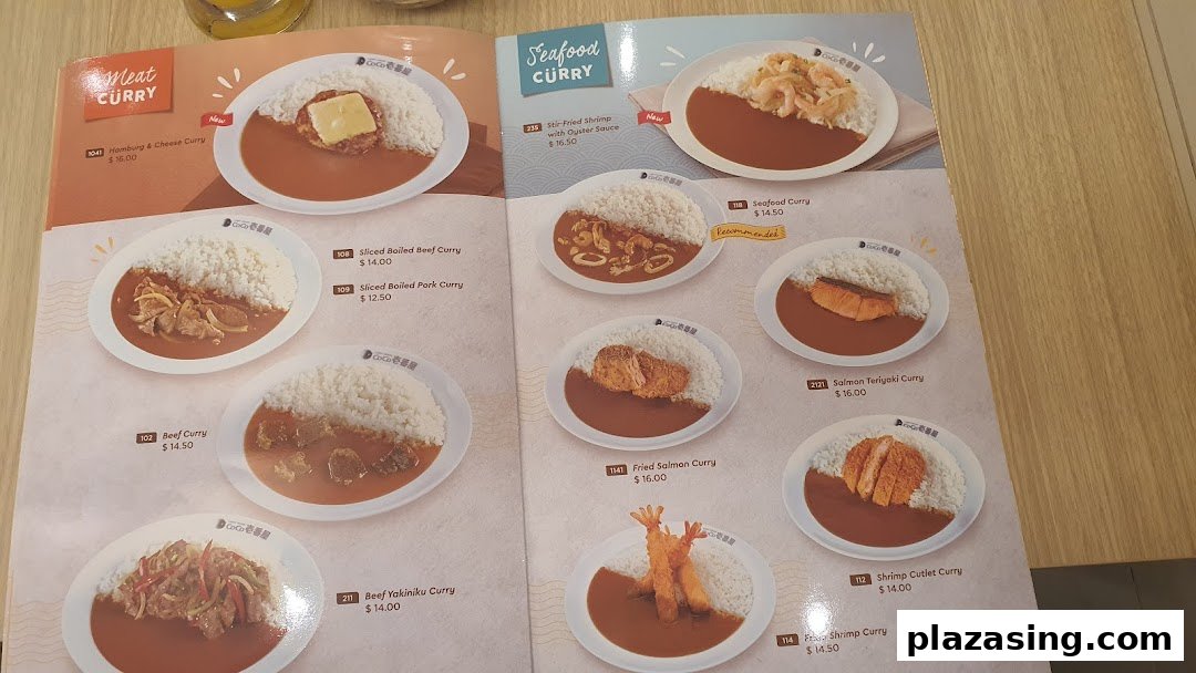 A detailed menu page from CoCo ICHIBANYA featuring various curry dishes with meat and seafood.