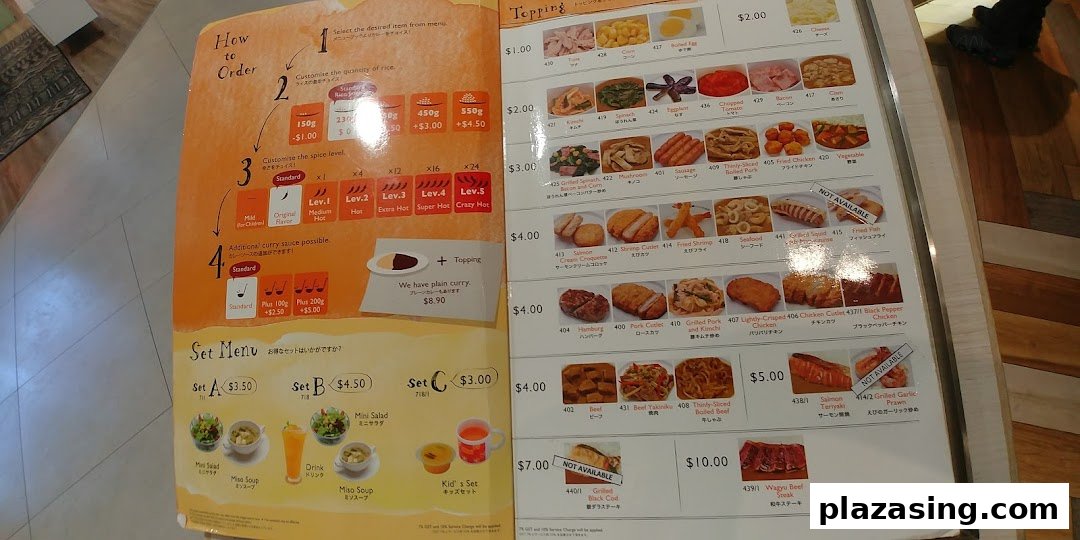 A detailed menu displaying curry customization options, various toppings, and set meals.