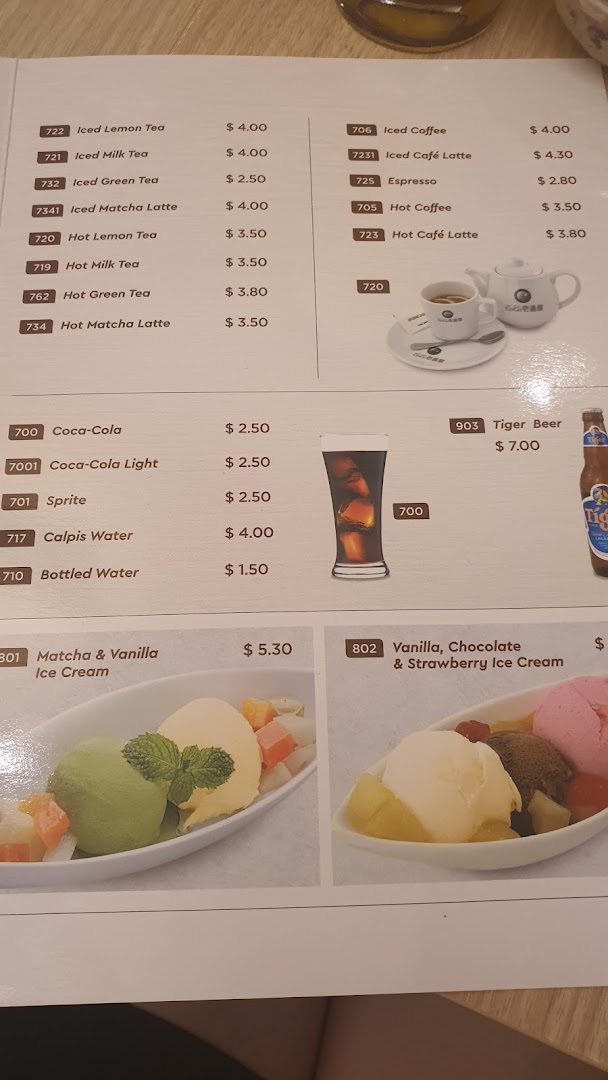 A detailed menu page displaying various beverages, soft drinks, and ice cream options with prices.