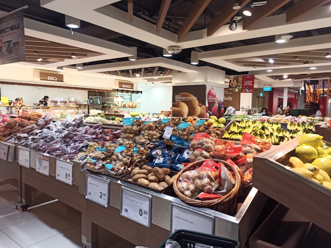 A vibrant interior view of CS Fresh, showcasing a wide array of fresh fruits and vegetables.