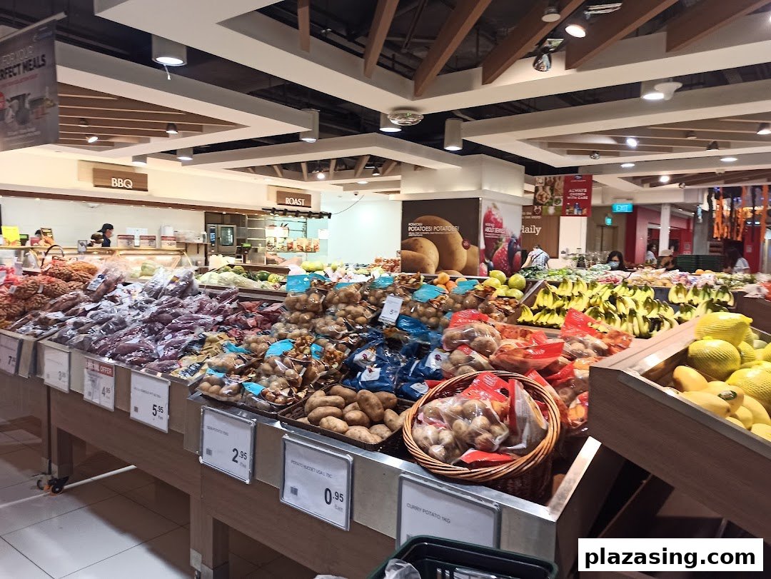 A vibrant interior view of CS Fresh, showcasing a wide array of fresh fruits and vegetables.