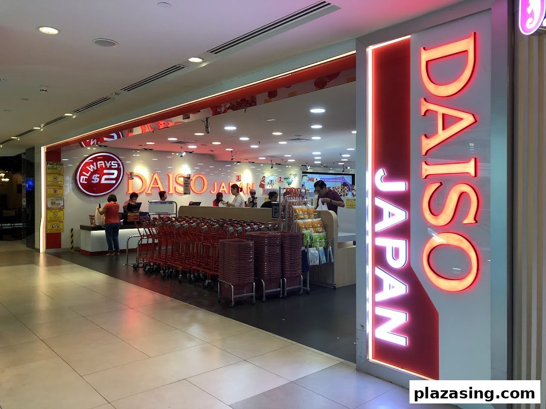 The brightly lit entrance of Daiso Japan, showcasing its 'Always $2' pricing and bustling interior.