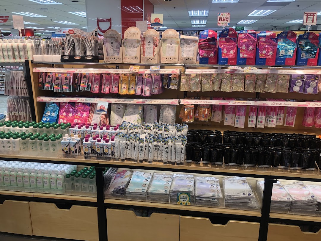 Shelves stocked with a variety of beauty and personal care products, including face masks and lotions.