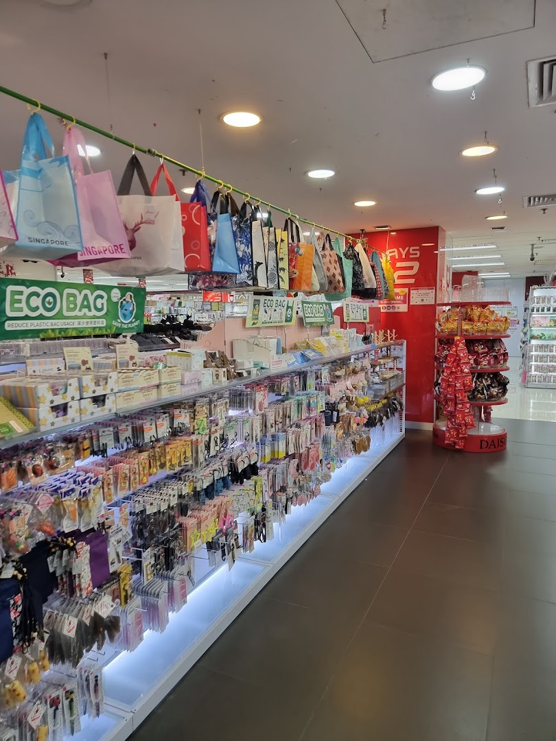Interior view of a DAISO store, showcasing well-stocked shelves with diverse products and hanging eco-friendly bags.
