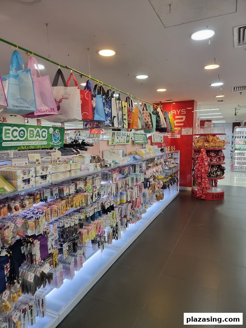 Interior view of a DAISO store, showcasing well-stocked shelves with diverse products and hanging eco-friendly bags.