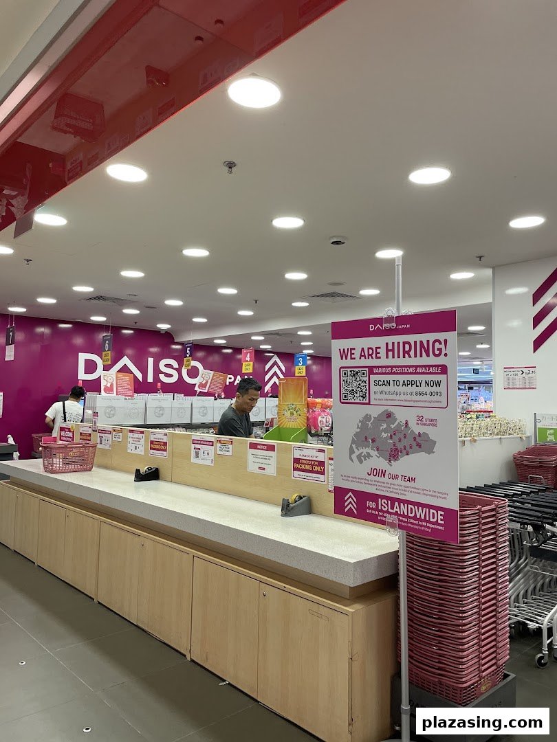 Interior view of Daiso's self-packing area, showcasing convenience and a hiring advertisement.