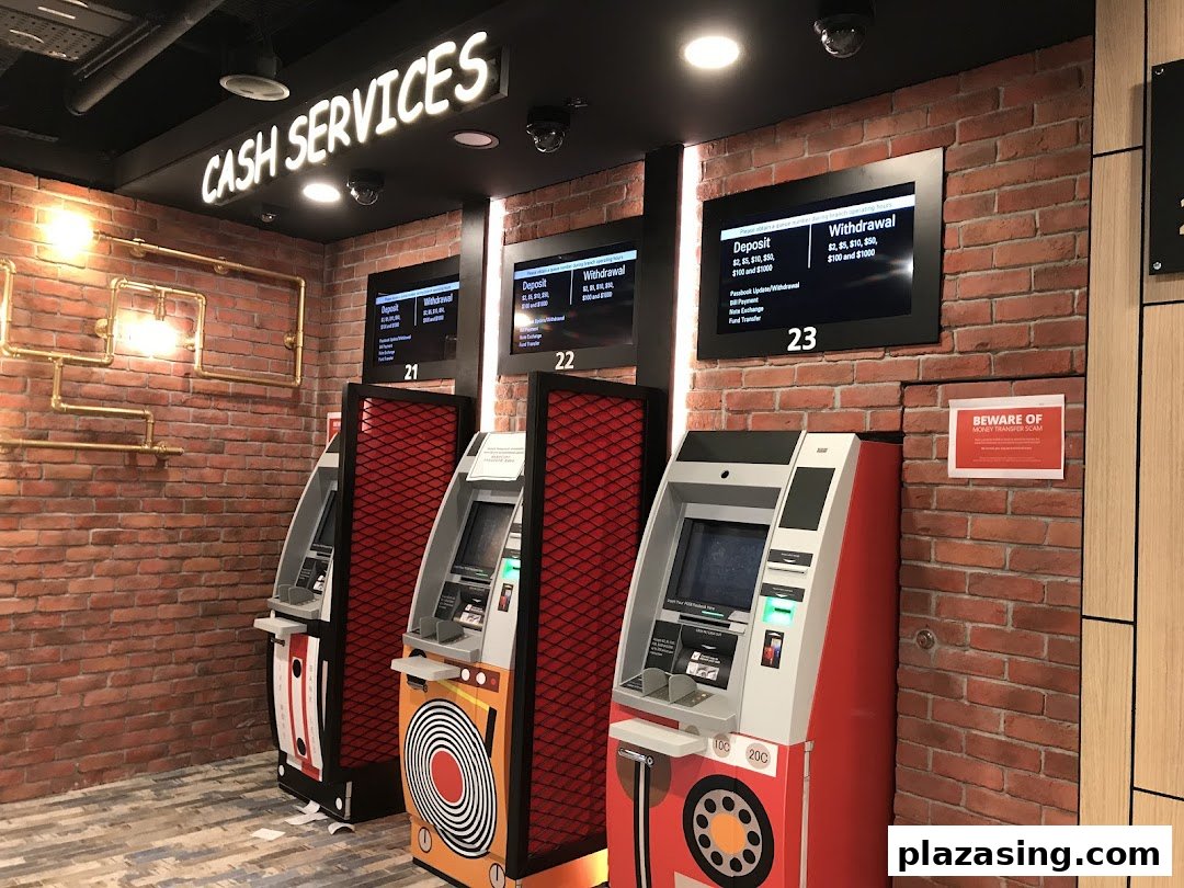 Interior view of DBS Plaza Singapura's cash services area with multiple ATMs.