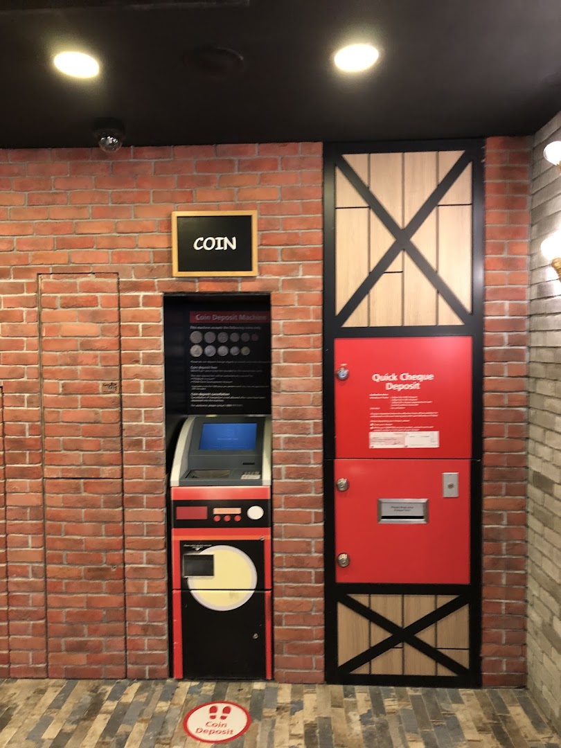 A coin deposit machine and quick cheque deposit box at DBS Plaza Singapura.