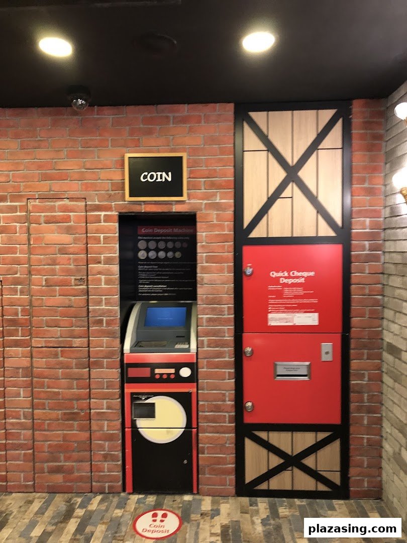A coin deposit machine and quick cheque deposit box at DBS Plaza Singapura.