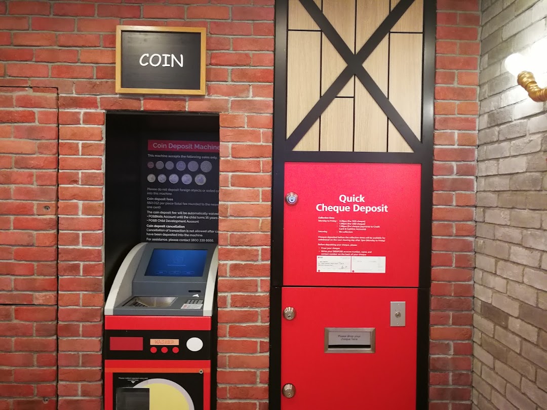 An interior view of DBS Plaza Singapura Branch showing coin and quick cheque deposit machines.
