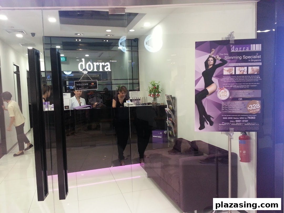 The shopfront of Dorra Slimming, featuring its entrance, reception area, and a promotional poster.