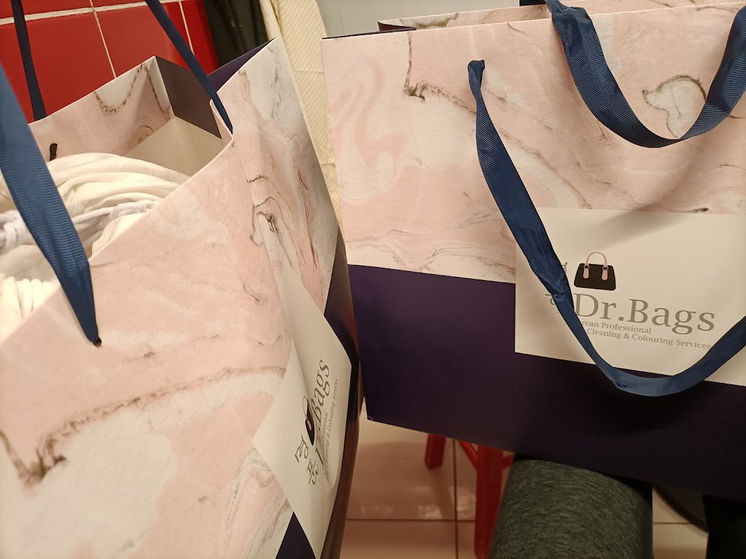 Two Dr.Bags shopping bags with marble-patterned tops and dark blue bases, featuring the shop's logo.