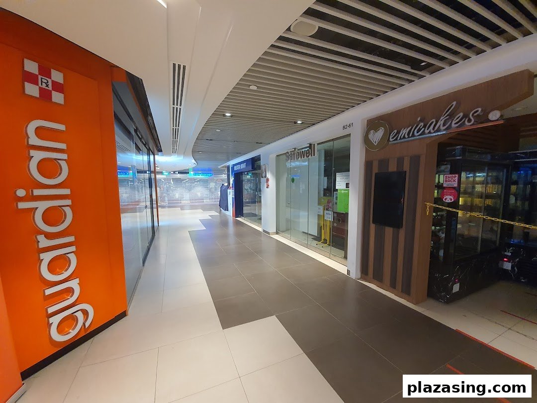 The shopfront of Emicakes, a bakery, located in a mall corridor.