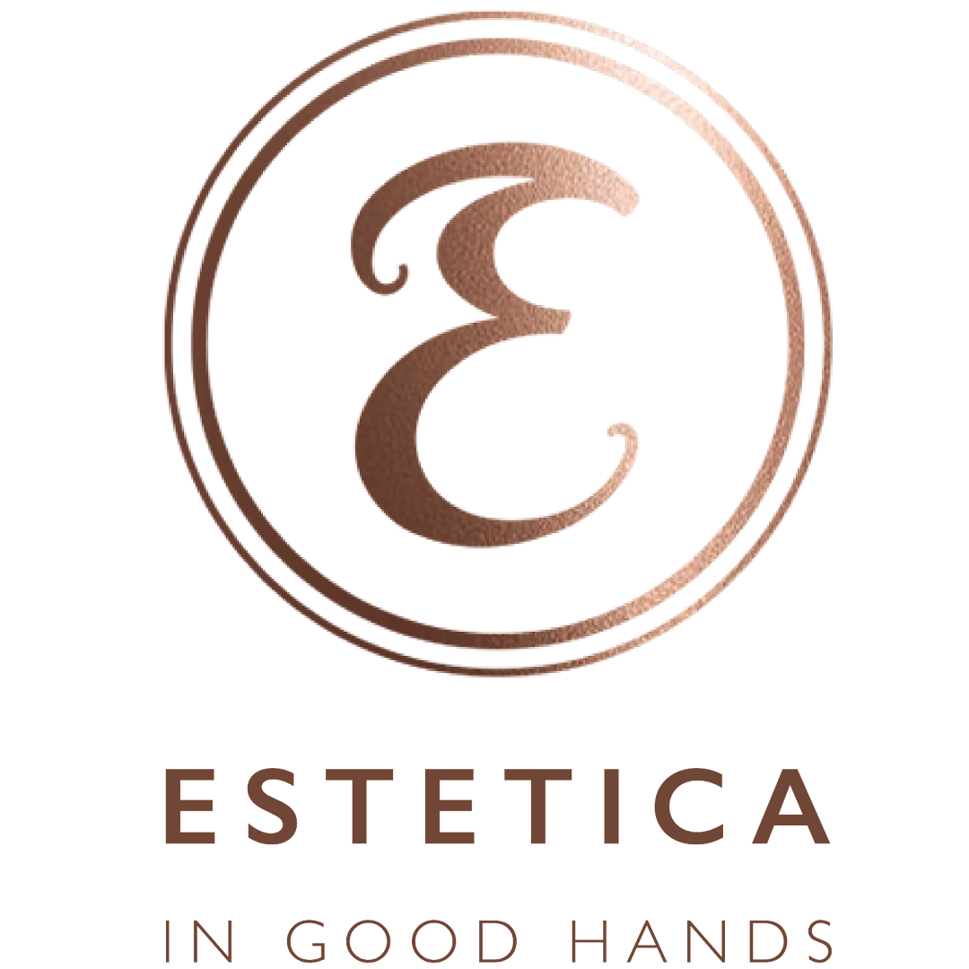 The Estetica Beauty logo featuring a stylized 'E' within a circle and the tagline 'IN GOOD HANDS'.