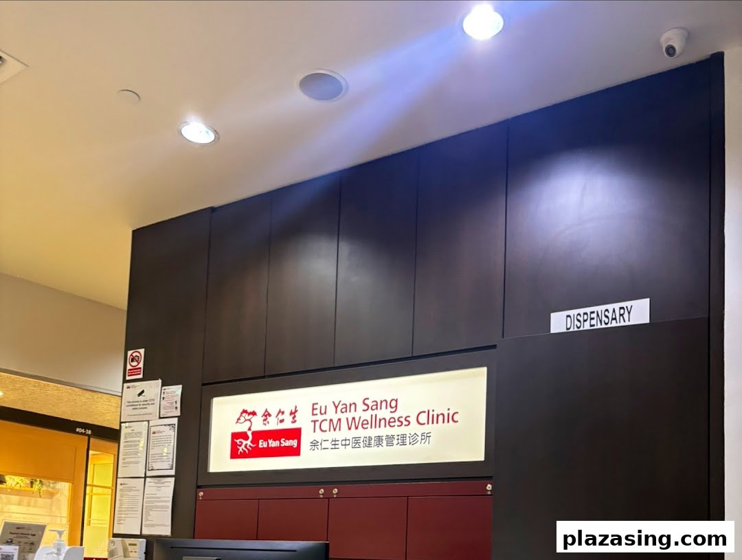 Interior view of Eu Yan Sang TCM Wellness Clinic reception area with clinic signage.