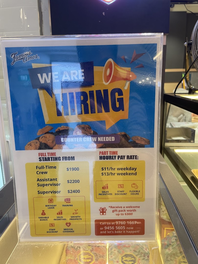 A Famous Amos hiring sign detailing full-time and part-time job opportunities for counter crew.