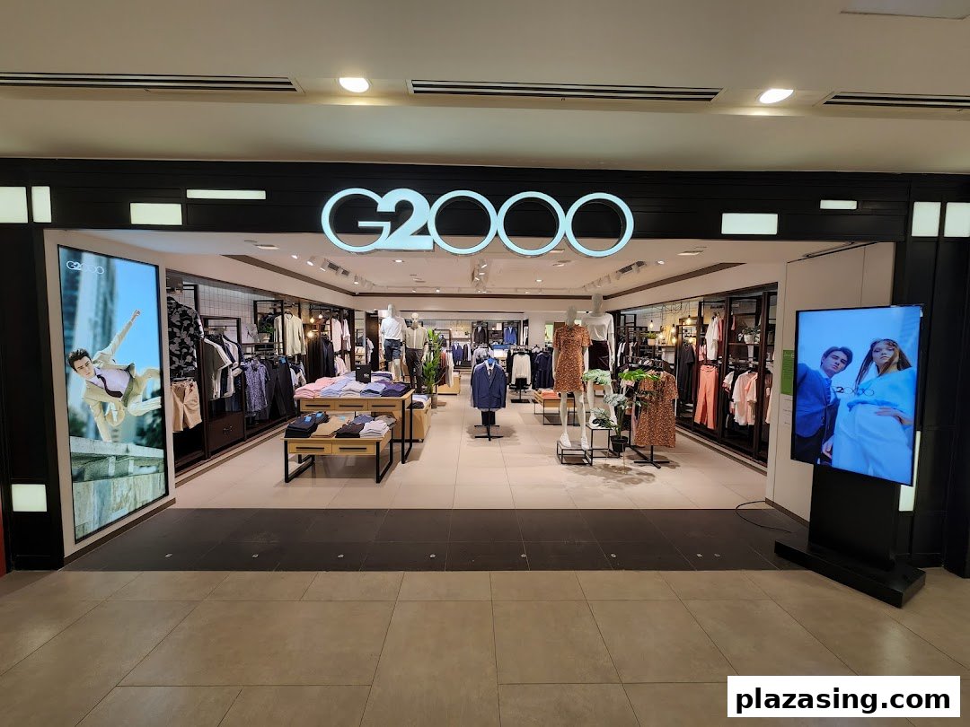 The G2000 shop entrance showcasing modern apparel displays and digital promotional screens.