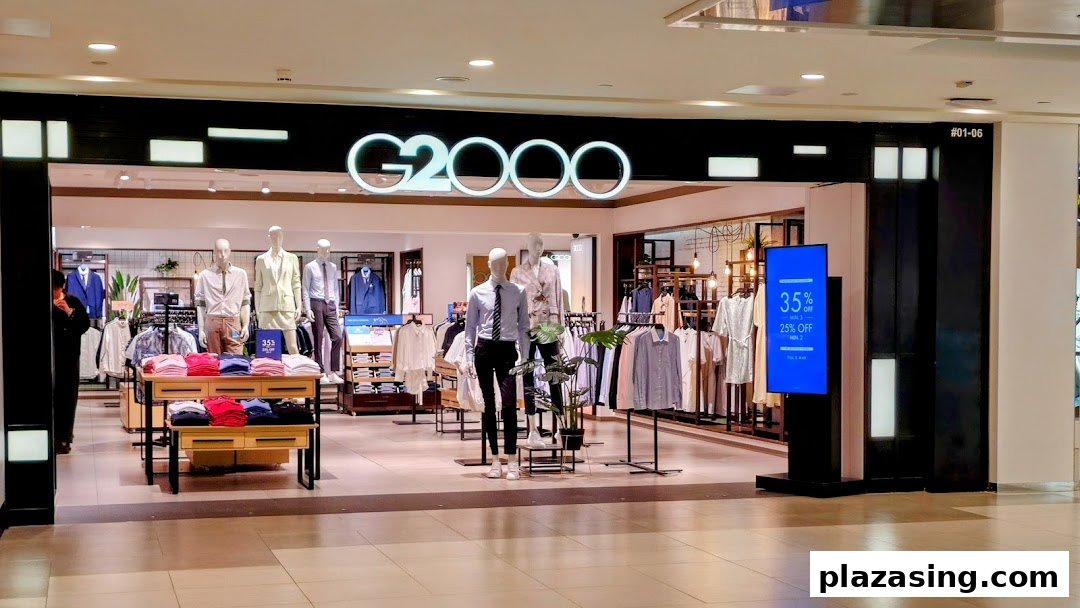 The G2000 shop entrance showcases stylish apparel on mannequins, inviting shoppers inside.