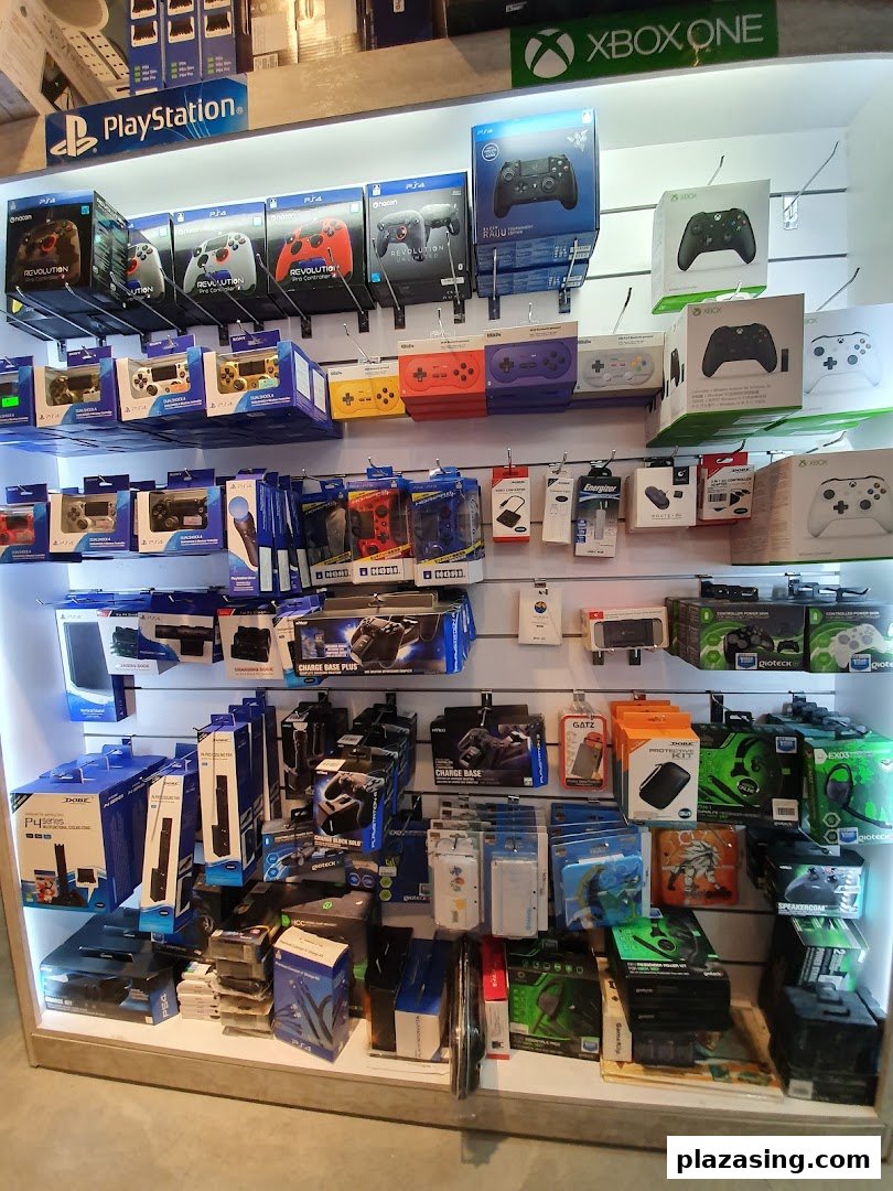 Shelves packed with gaming controllers and accessories for PlayStation and Xbox.