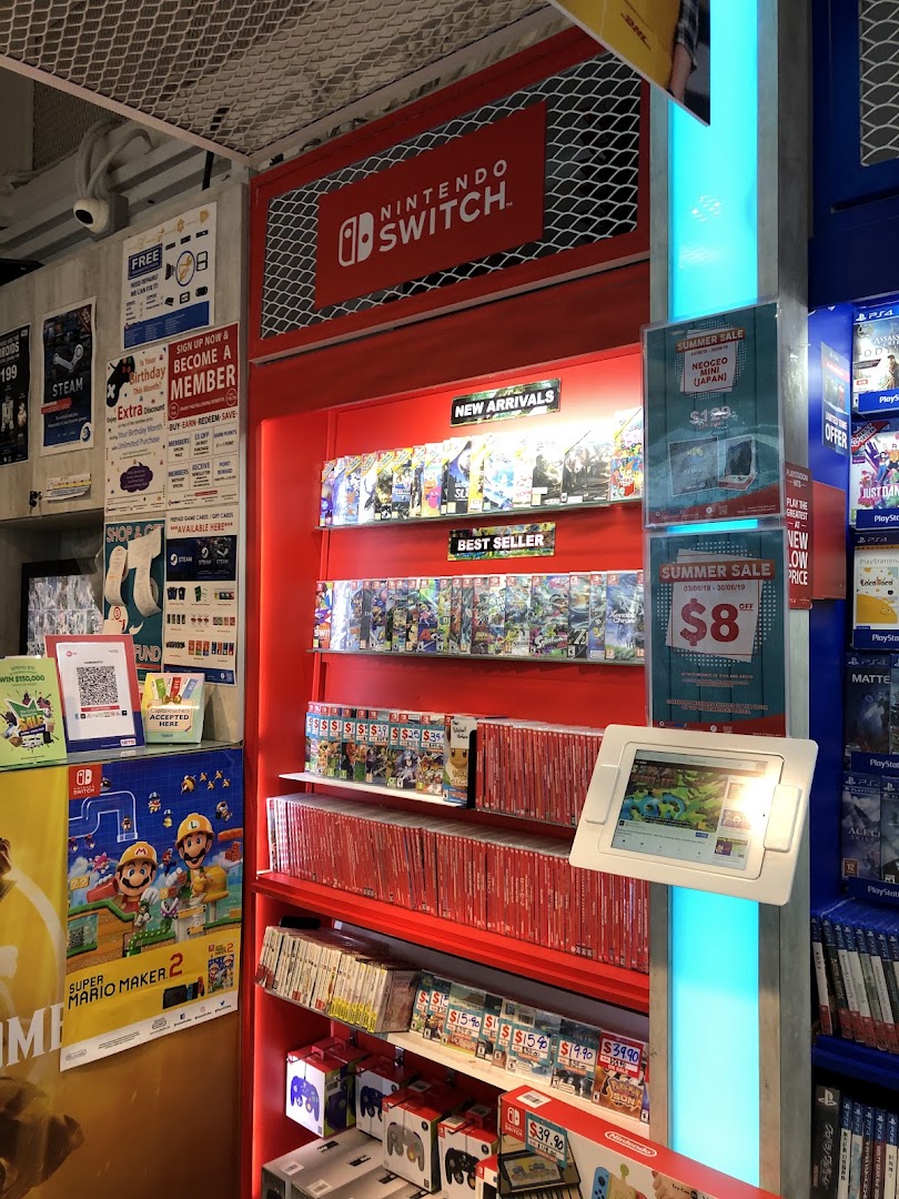 An interior view of GameMartz, featuring a vibrant display of Nintendo Switch games, new arrivals, and accessories.