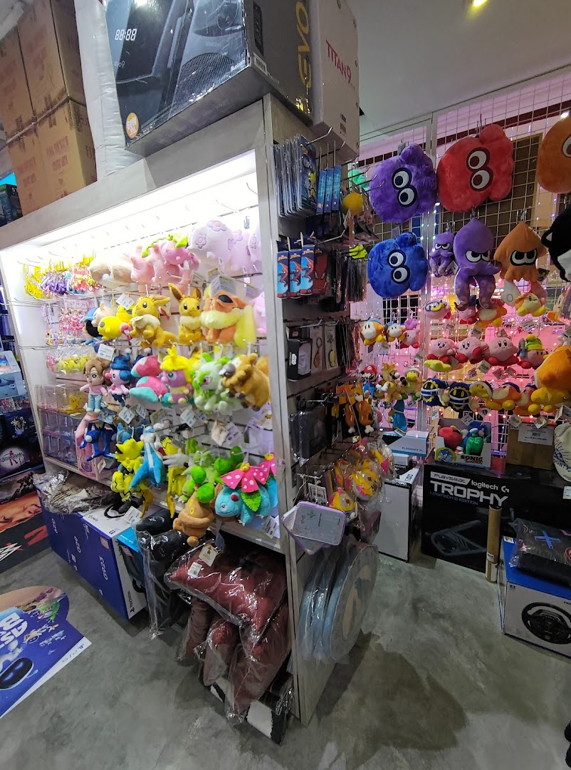 Shelves filled with gaming plushies, collectibles, and accessories inside GameMartz Plaza Sing.